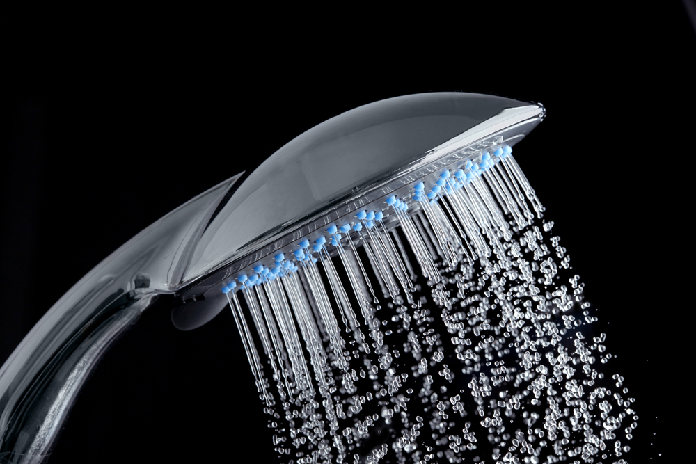 Shower,With,Running,Water,Over,Black,Background
